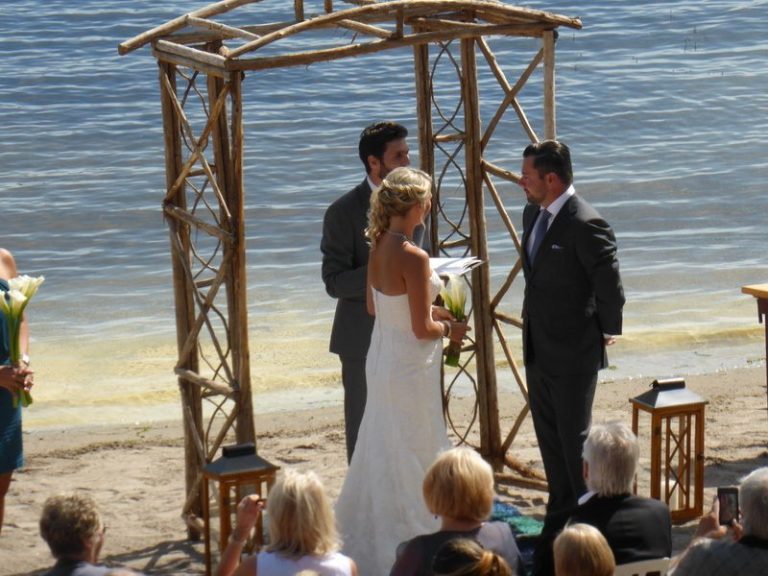 Serena and Andrew's beach wedding ceremony.