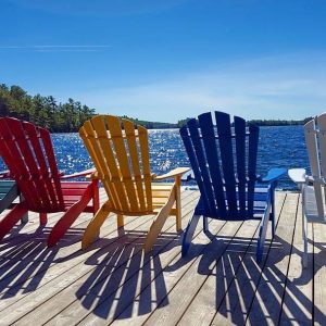 Adirondack chairs on the pier