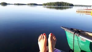 Photo of a Woman on the Dock Before Heading Out for Some Bass Fishing in Ontario.