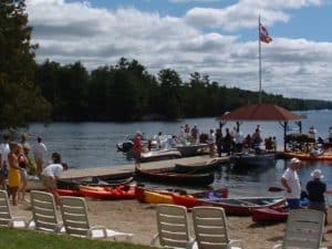 A family gathers on the dock before a boat ride.