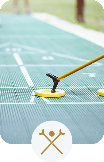 People playing shuffleboard