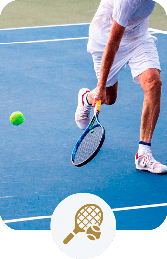 Older man playing tennis