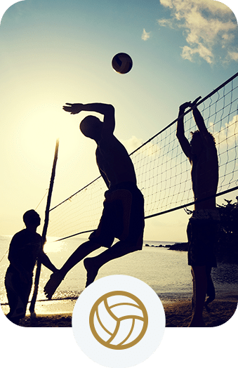 People playing beach volleyball