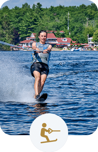 Boy waterskiing on a lake