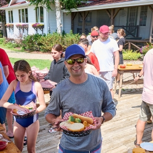 Family and friends enjoying an outdoor BBQ