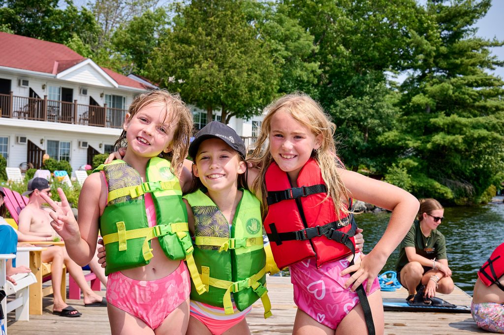 Kids Club friends on the dock