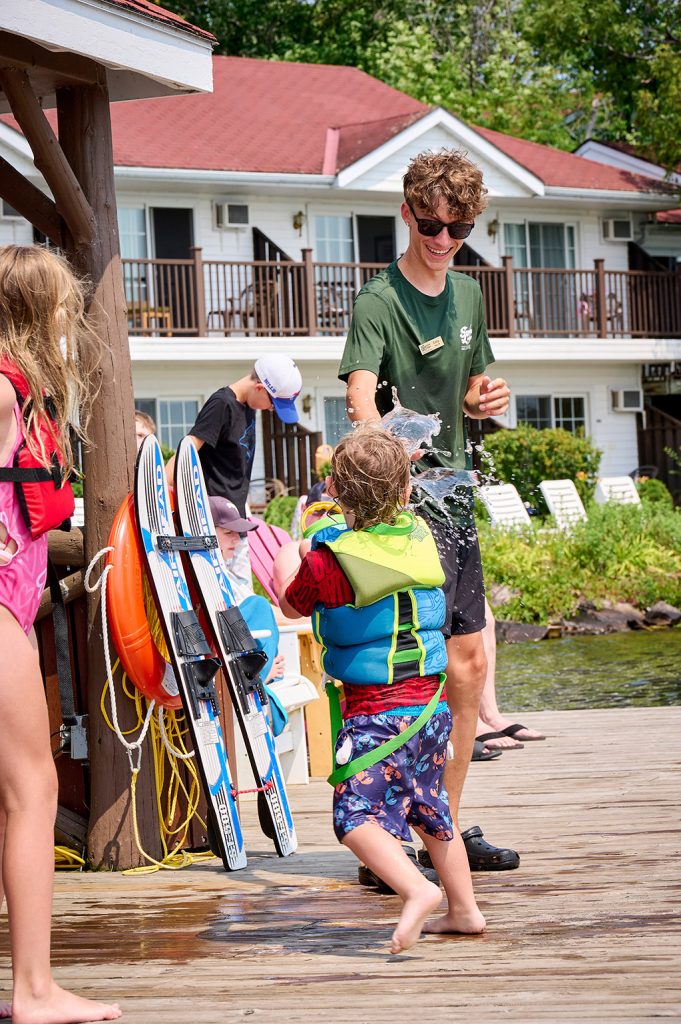 Kids Club water fight on the dock