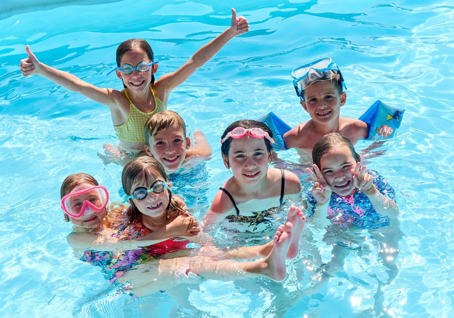 Kids having fun in a swimming pool